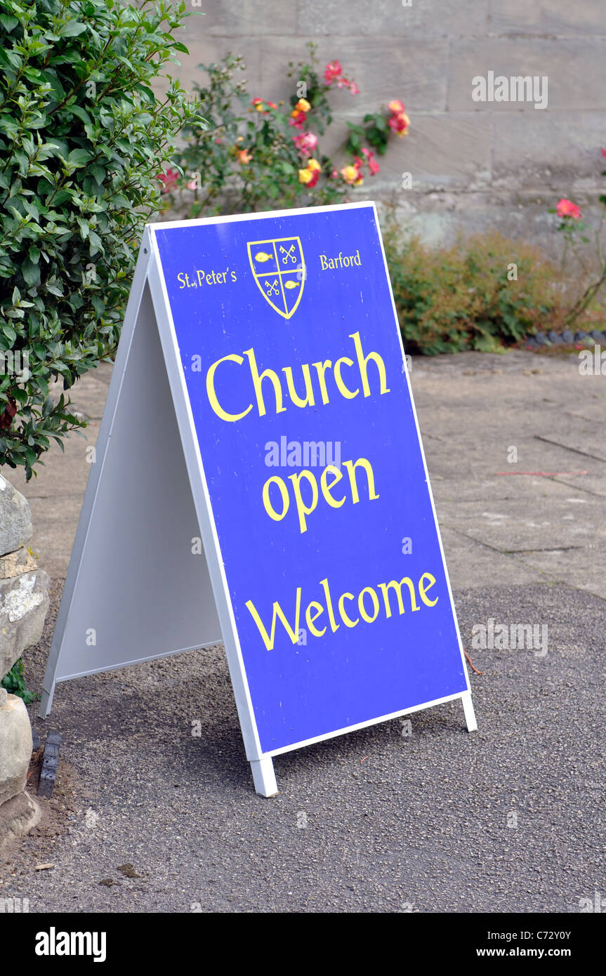 Church open Welcome sign, St. Peter`s, Barford, Warwickshire, England, UK Stock Photo